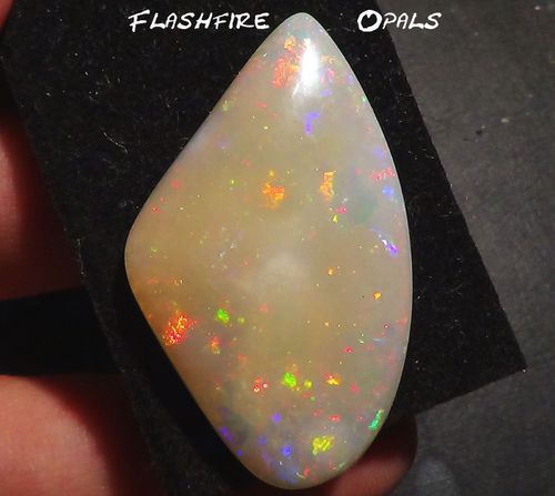 37.2 ct.!! GREAT WHITE OPAL RED-MULTICOLOR 3-D