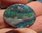 14.ct. GEM SOLID BLACK PICTURE OPAL GREEN-BLUE-TURQUISE